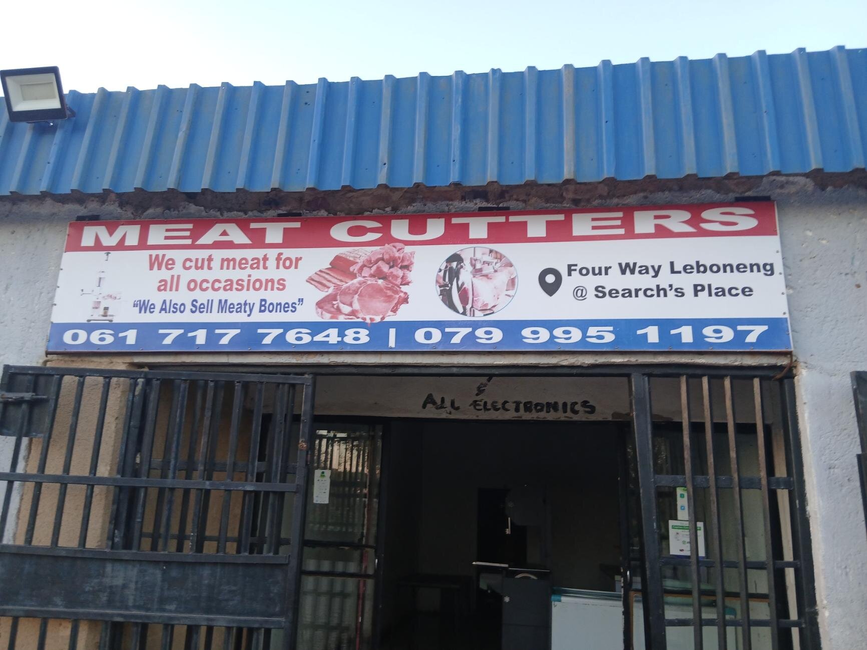 Meat Cutters shop entrance showing the full signage